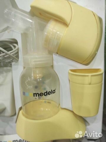 Молокоотсос medela электрический