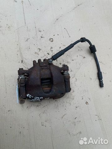 Суппорт тормозной передний левый Peugeot 308