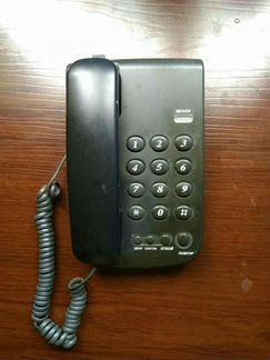Проводной телефон