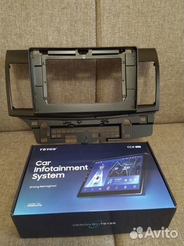 Рамка магнитолы Mitsubishi Lancer X