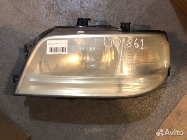 Фара левая Nissan Cube