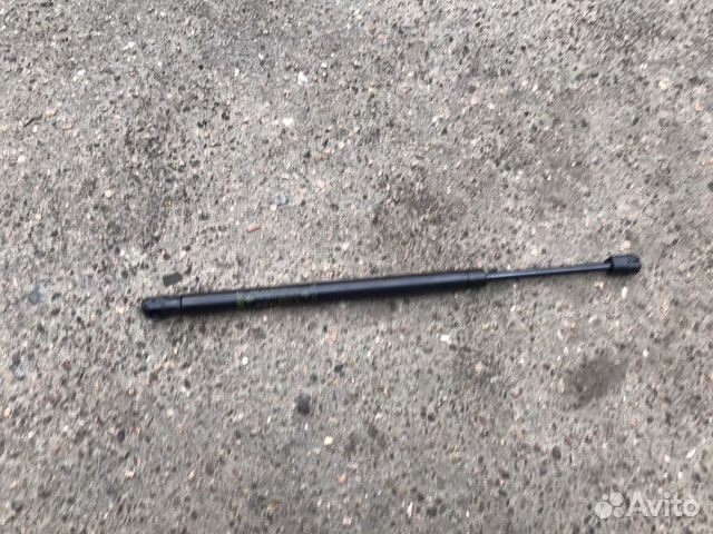 Амортизатор заднего сиденья Chevrolet Tahoe III