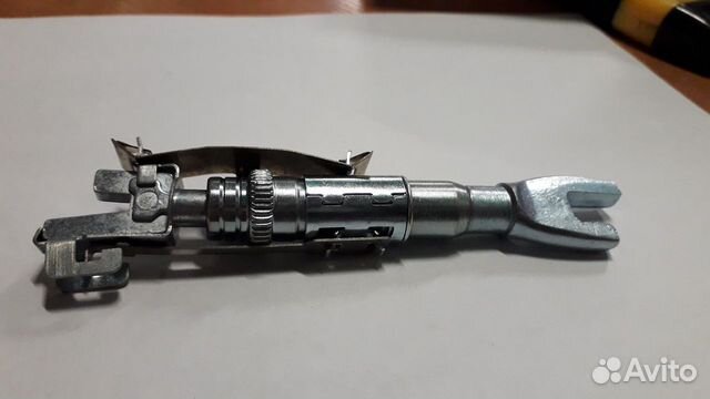 Механизм развода колодок Nissan Micra K12 Note E11