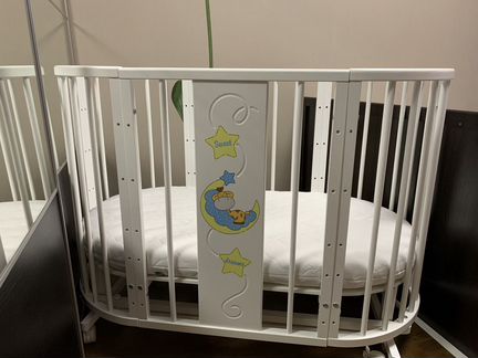 Детская кроватка-трансформер с маятником