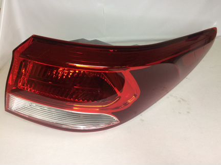 Фонарь левый наружный Киа Рио 4